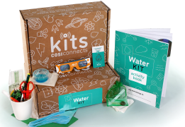 brown boxes, solar glasses, a cup of supplies and an instruction booklet