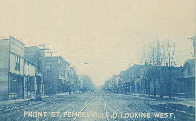A row of buildings line each side of the street, with the phrase "Front St. Pemberville, O. Looking West" printed on the bottom.