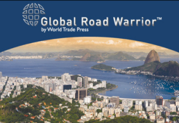 The words Global Road Warrior by World Trade Press hang over a metropolitan coastline.